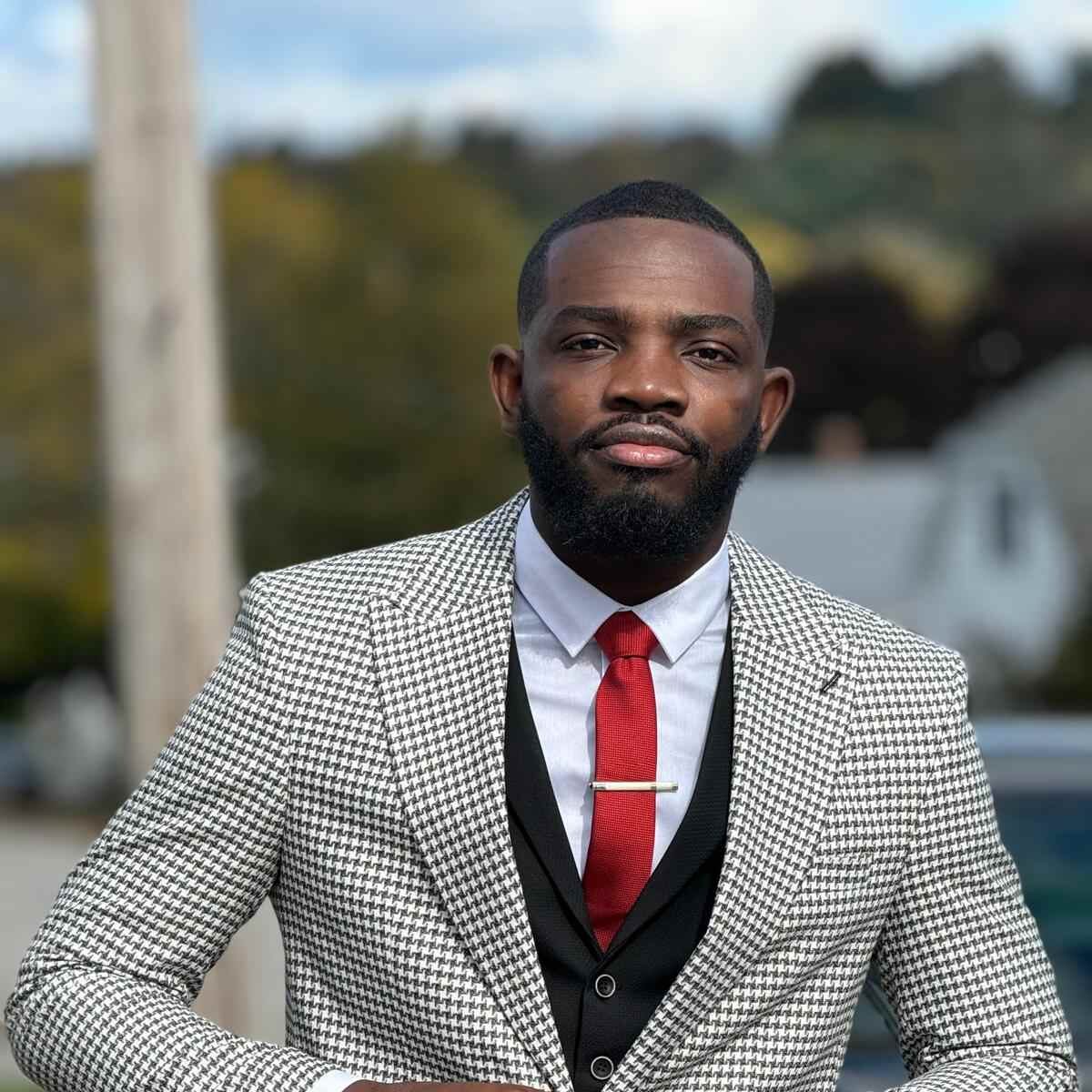 Portrait photo of Elysée Mukendi, COO and Administrator of Zion Care
